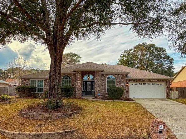 Inland Pensacola neighborhoods such as Brent and Cantonment with single-family homes