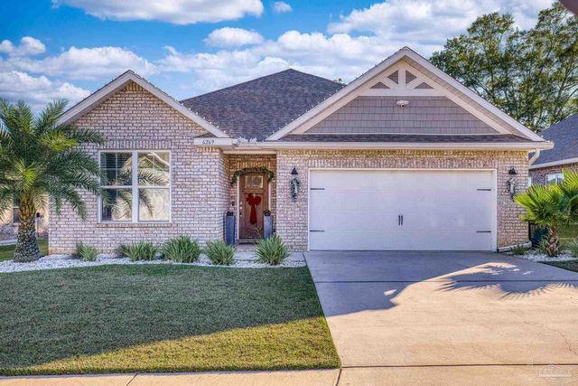 Pensacola Florida home with mailbox representing delinquent property tax notice