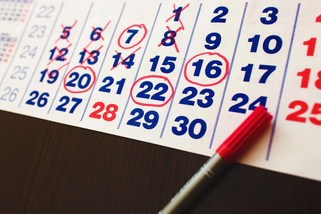 Clock and calendar representing timeline of delinquent tax process